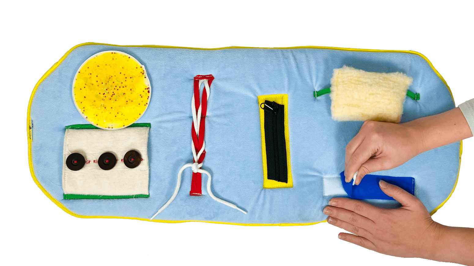 tapis coussiné d'activité avec des textures et des objets variés pour stimuler la motricité